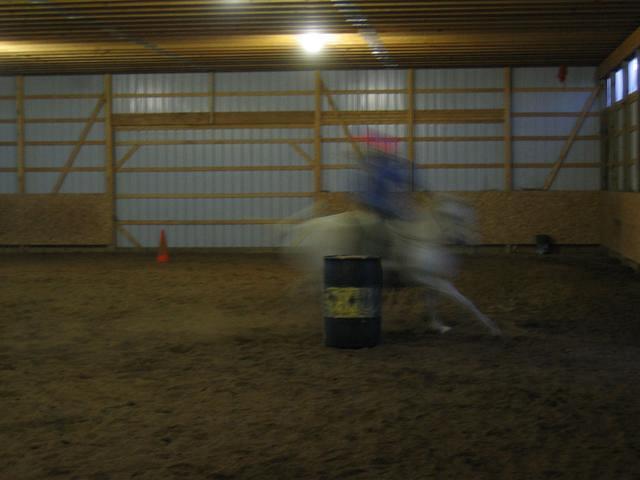 Kristen practicing barrel racing on Sesna.  The digital camera wasn't set up right to for the speed, but you get a good idea of how fast she was moving.