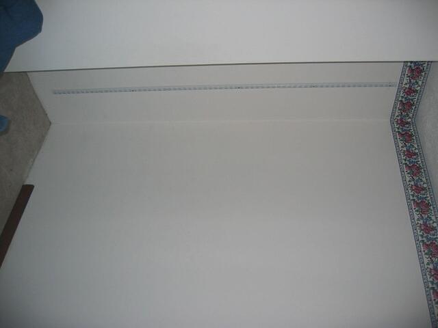 Living room alcove (wall next to fridge)