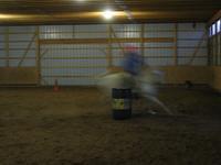 Kristen practicing barrel racing on Sesna.  The digital camera wasn't set up right to for the speed, but you get a good idea of how fast she was moving.