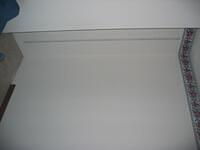 Living room alcove (wall next to fridge)